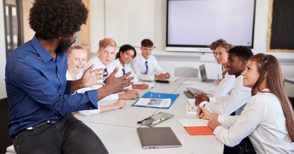 Teacher in classroom with students